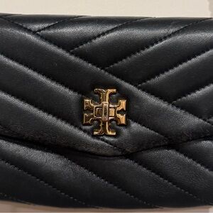 Tory Burch Kira Chevron Quilted Crossbody wallet on a chain.